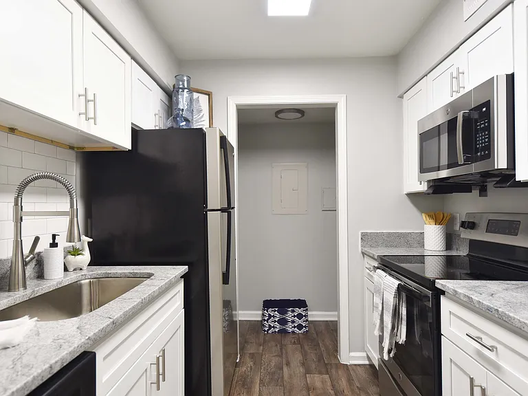 Kitchen with granite counters and stainless appliances