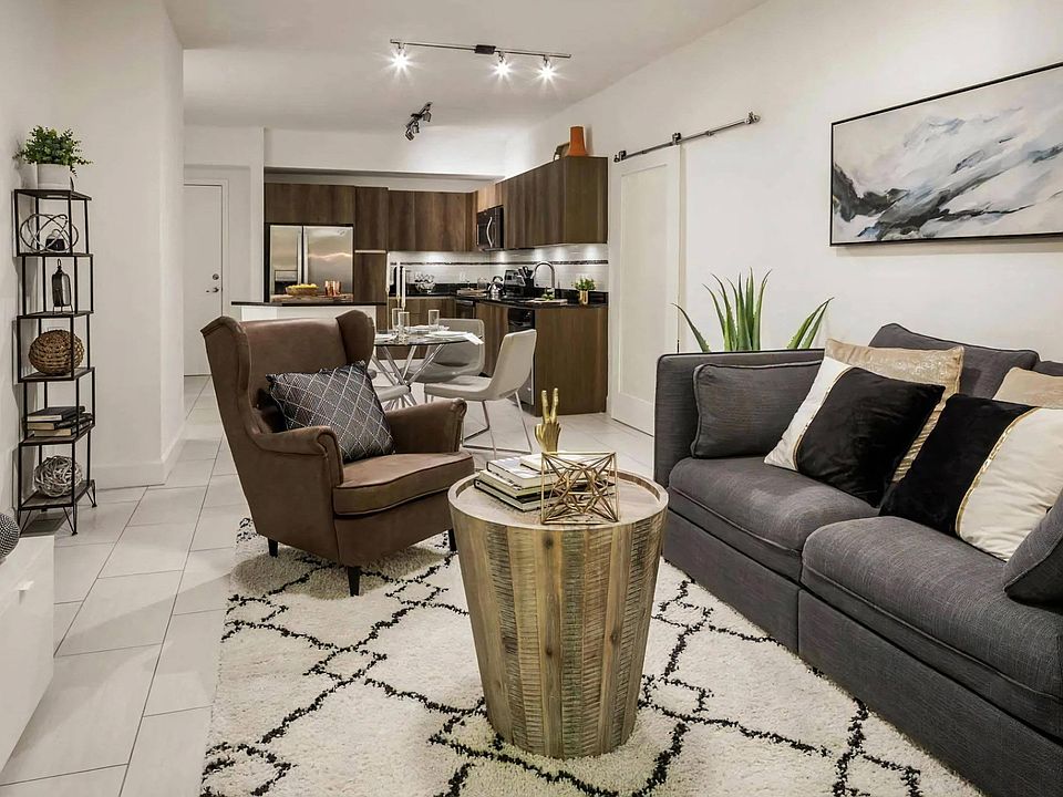 Large Living Spaces Connected with Kitchen and Dining Areas