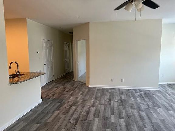 As soon as you enter into the Hall, side kitchen and entrance to the 2nd Bed Room