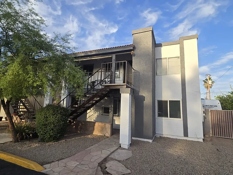 Small 4 unit building with private backyard