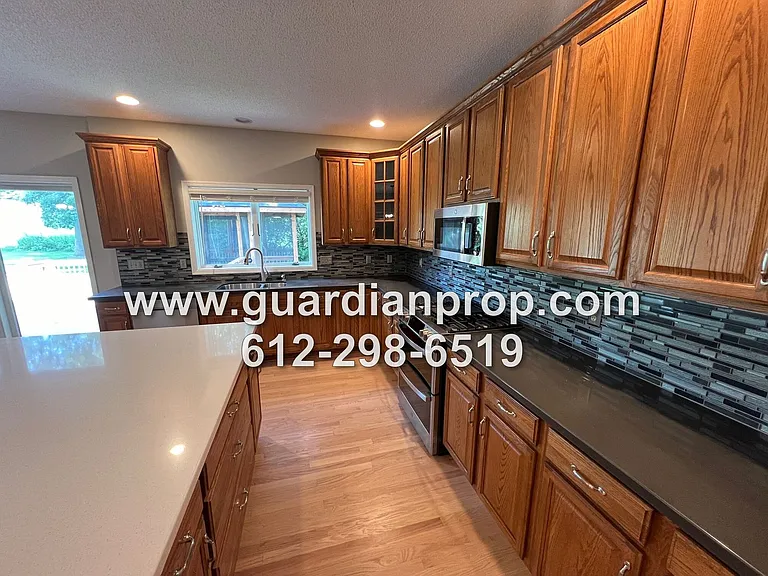 7303 Hidden Valley Ln S — Photo 8
