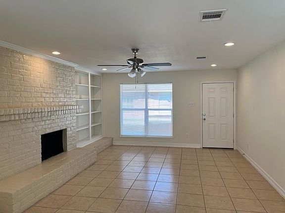 Living Room, Front Door with New Windows Throughout House