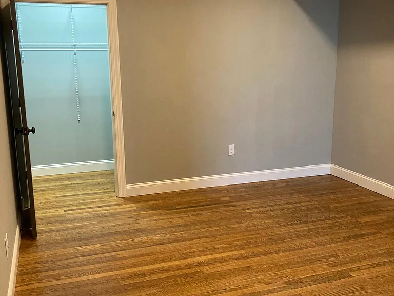 Living room with view of storage closet