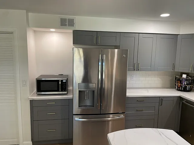 Large fridge and microwave included.