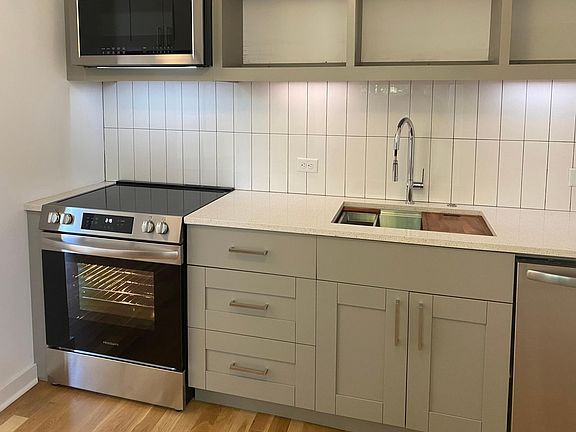 You enter through the all-new kitchen.
