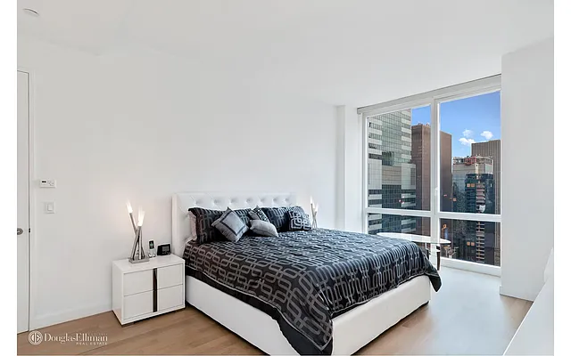 Sold by Douglas Elliman | media 11