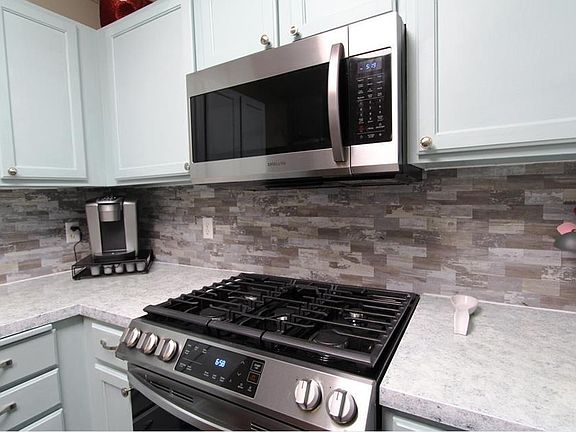 Stainless steel gas range & oven.