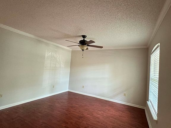 Living room. Front door entryway is at bottom right - not visible.