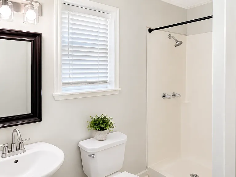 Full bath with shower-tub combo with ceramic tile