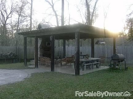 Outdoor Fireplace
						:
						Solid Cypress w Large Brick Fireplace and Cypress Mantel