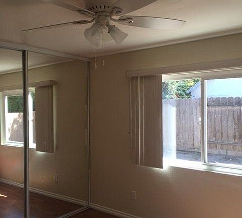 Master bedroom with ceiling fan