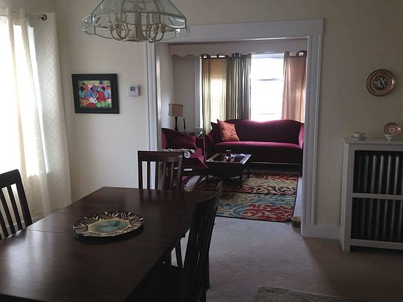 Looking through dining room to living room