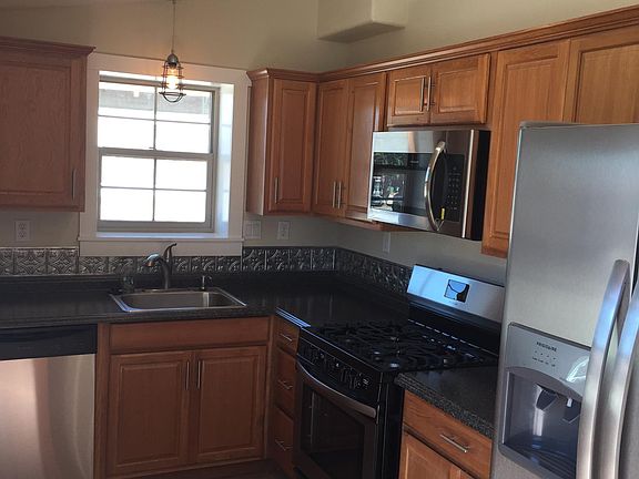 Kitchen w/ Stainless Steel Appliances