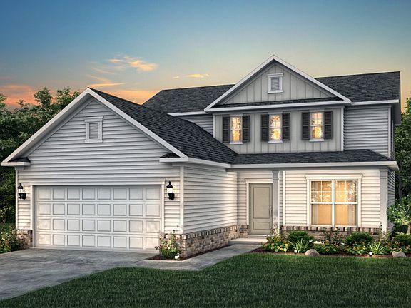Hartwell Exterior LC2G features hardie siding, brick, covered porch and 2 car garage