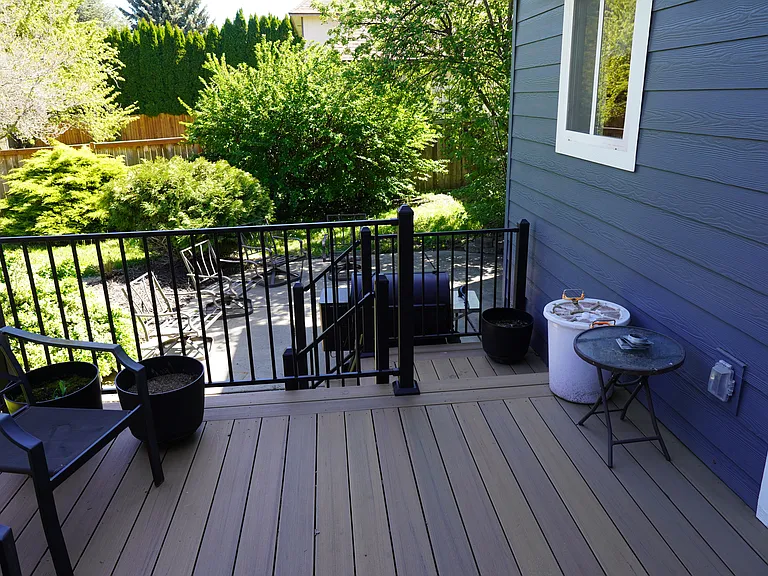 stairs lead to ground level patio