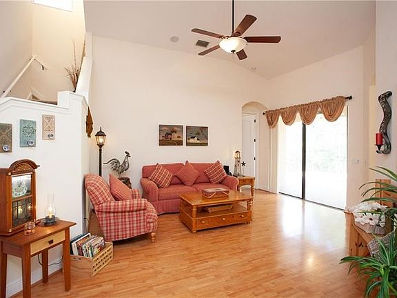 Formal living room with access to the screened lanai.