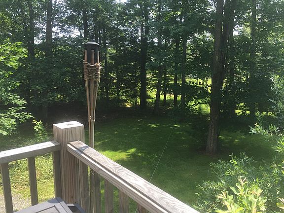 View from deck onto private back yard.