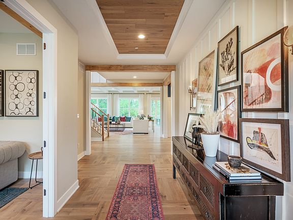 Inviting foyer with tray ceiling