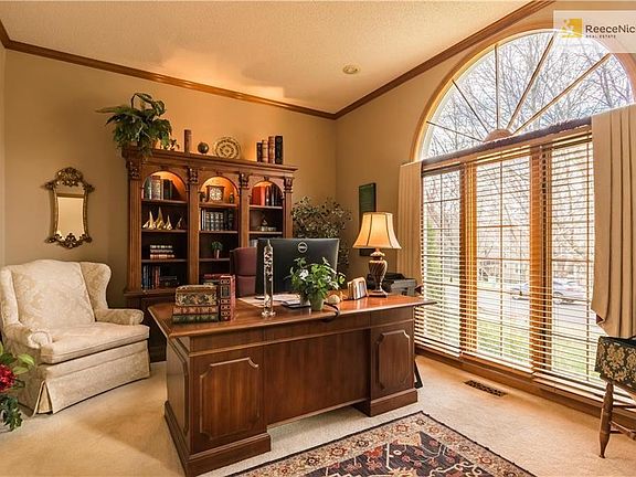 First floor office, just off the front door.