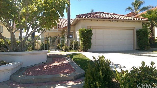 Fabulous single-level Mediterranean home in Marina Hills. No