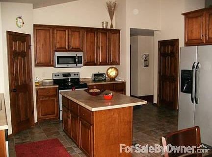 Kitchen with walk-in pantry and island