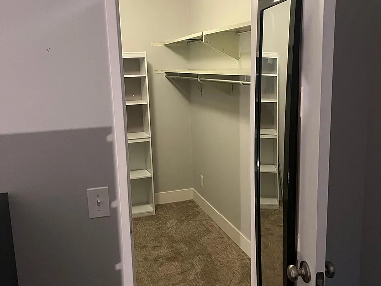 main bedroom walk in closet