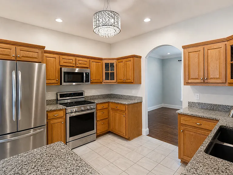 Kitchen with stainless steel appliances and granite countertops