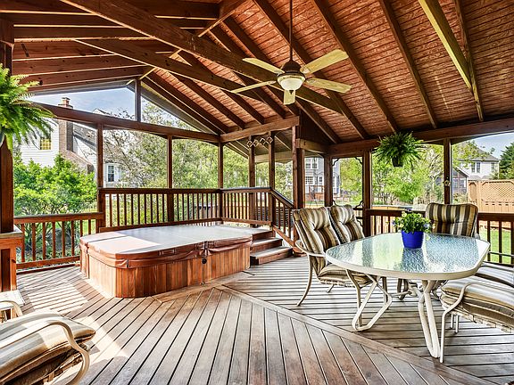Screened porch with hot tub