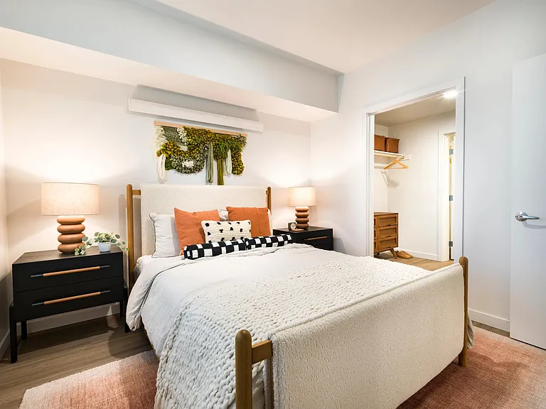 Enjoy the convenience of a dual-entry bathroom with a spacious pass-through closet for effortless flow and functionality.