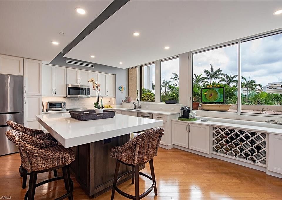 1st image of 7117 Pelican Bay BLVD #206