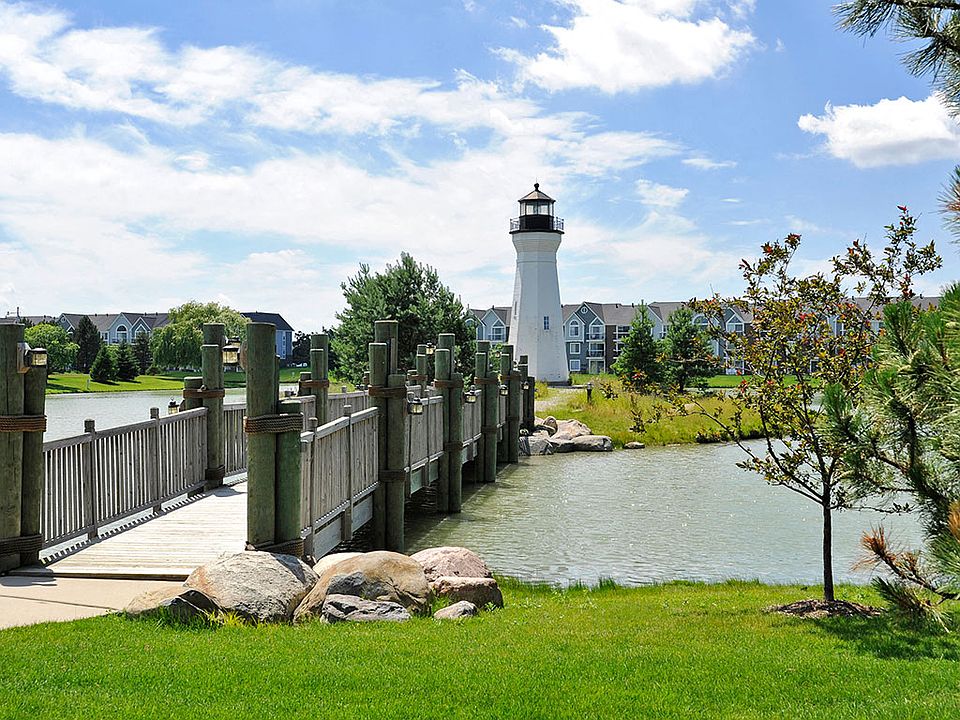 Lake with Lighthouse and Bridge