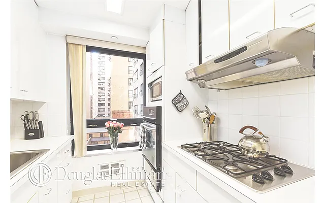 Sold by Douglas Elliman | media 13