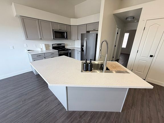 Granite countertops with newer appliances and cabinets