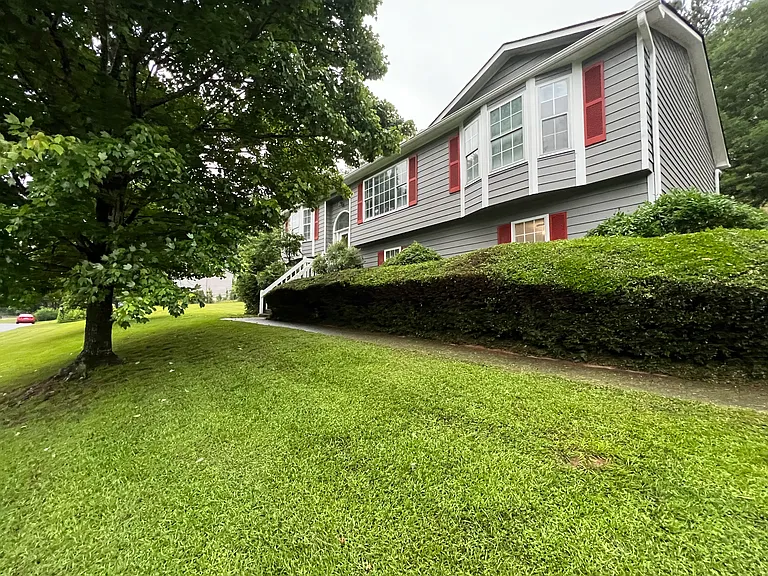 Yard is meticulously kept by a landscaping team - so no work for you, just enjoyment!
