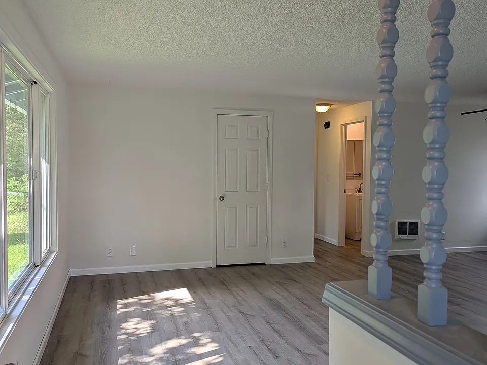 Inside the front door, living room angle 1.