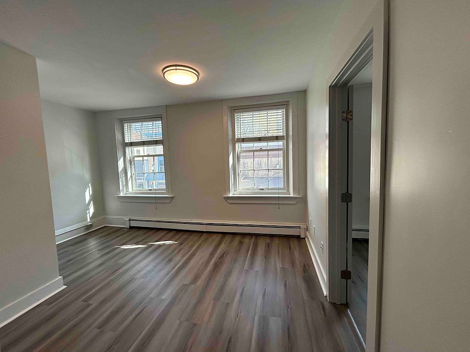 Living room, note: two windows overlooking Water Street.