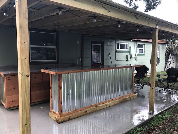Full outdoor kitchen & bar!