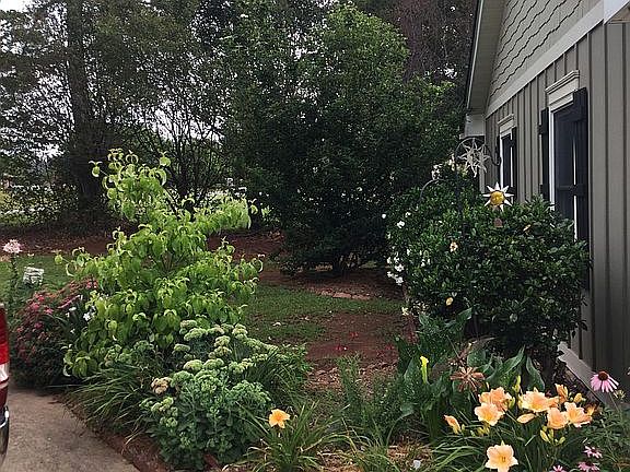 Circle drive flower bed