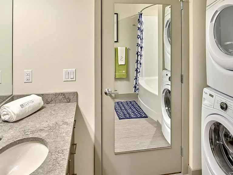 Bathroom with In-Home Washer and Dryer