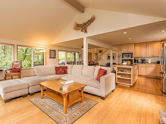 Great room with dining and kitchen in the background.