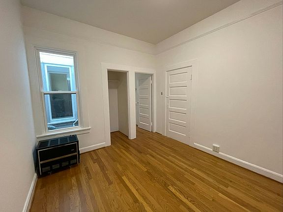 Bedroom (in center, between entry and dining/kitchen rooms)
