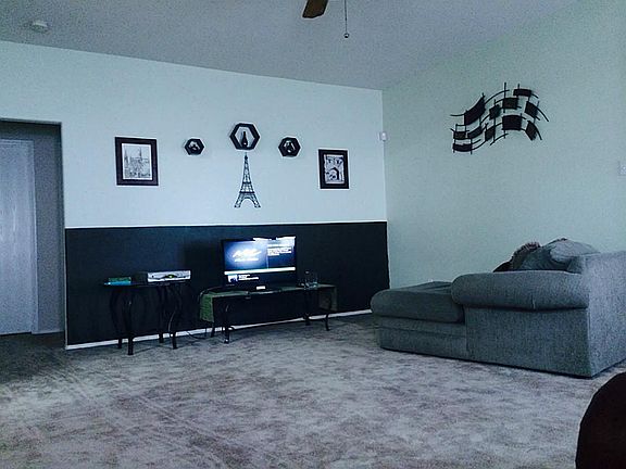 Split plan with an open floor plan with new carpet