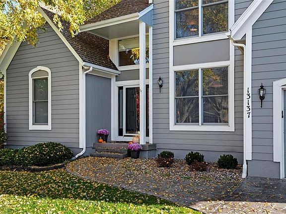 Stamped concrete drive and walkway adds to the curb appeal.