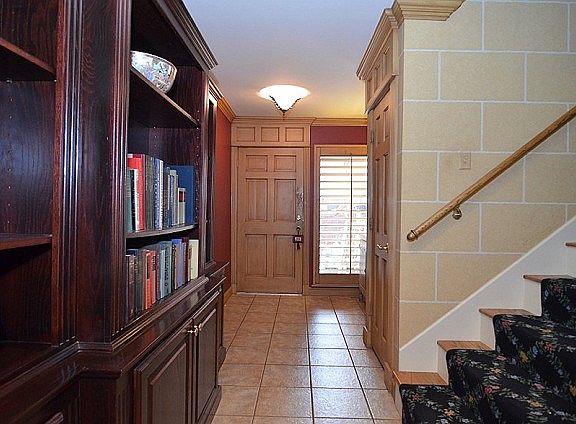 View shows the 1/2 bath door and stairs