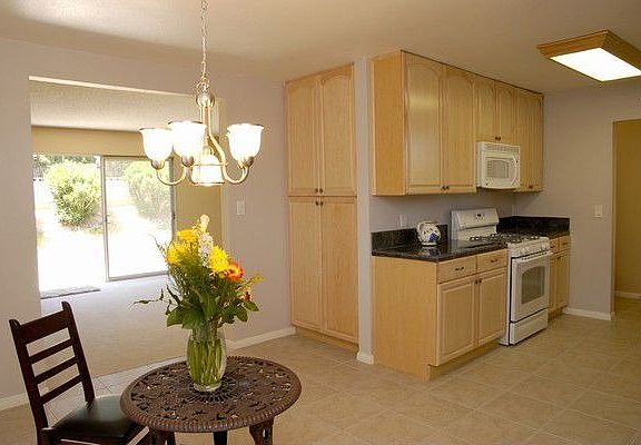 View of Kitchen toward living room and patio outside