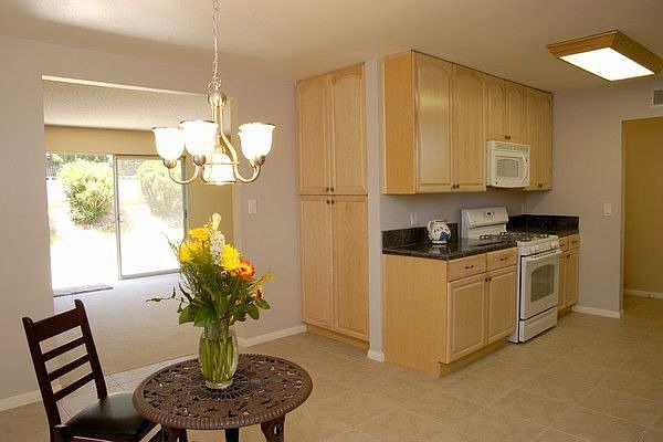 View of Kitchen toward living room and patio outside