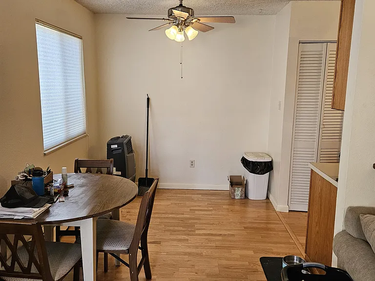 Small, Quaint Dining area outside of the Kitchen and Family room