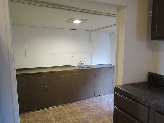 Alcove beside kitchen