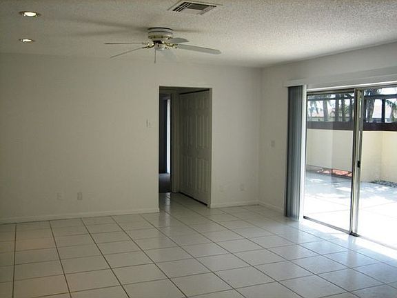 Living Room overlooks screened patio