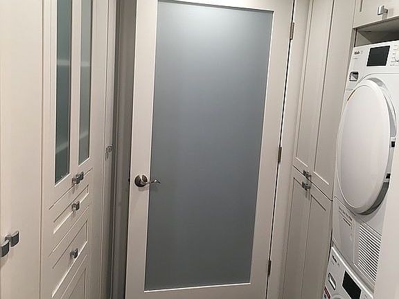 Miele stack w/d & CA closets